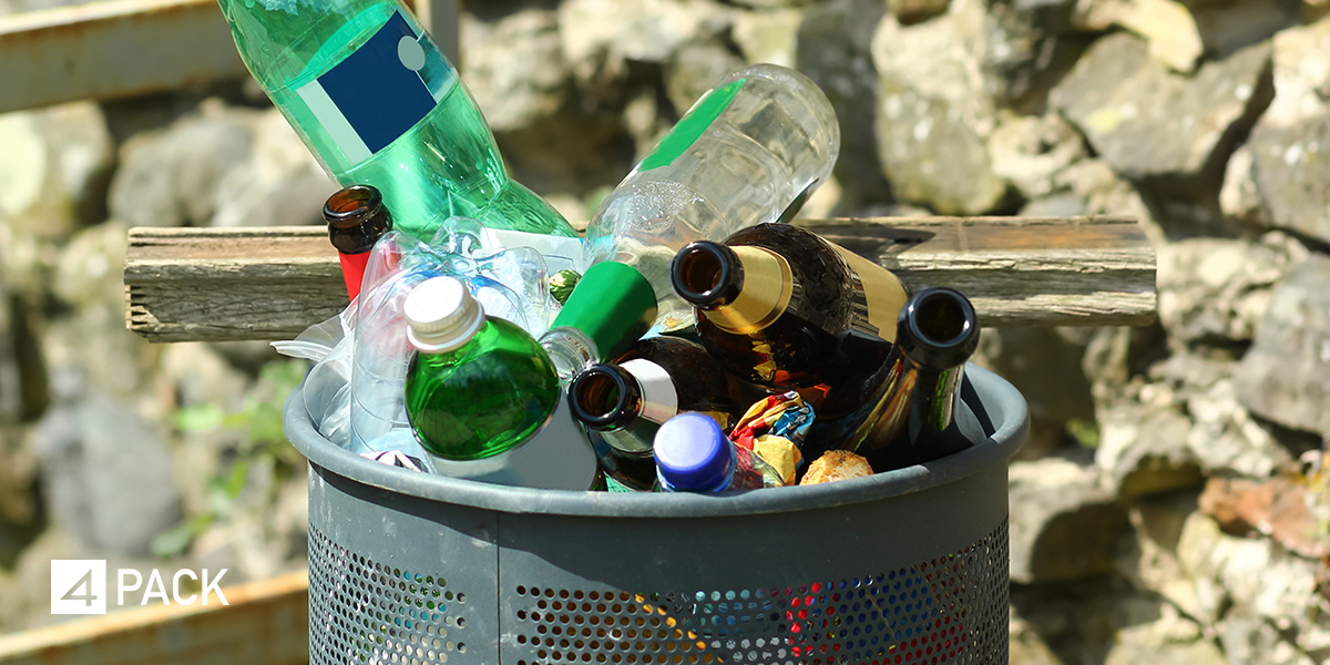 Wales deposit return scheme waved for UK aligned plans but drinks waste litter piles up – empty drinks bottle waste in a bin